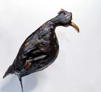 sculpture en argile feuille d or d'un oiseau par lionel le jeune